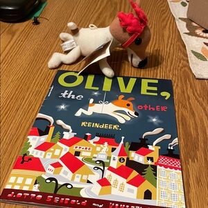 🐥 SCHOLASTIC Olive the other reindeer paperback book with Olive.